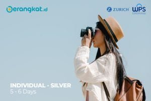 Rear view of asian man in hat with suitcase bag and backpack wal https://berangkat.id/wp-content/uploads/2023/02/ZURICH-Individual-Silver-5-6-Days_sml-300x200.jpg